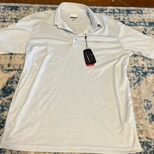 Greg Norman performance golf shirt. Size medium